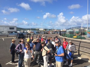 A group from Rick Steves Europe Tours enjoying getting the in-depth story on Historic Dingle